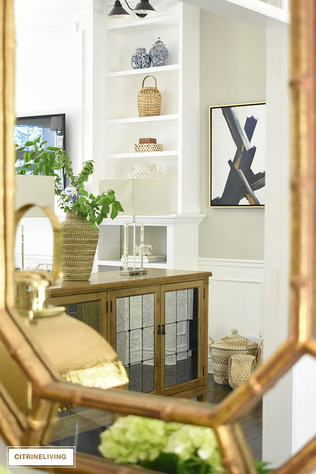 Use these simple summer decorating ideas to create a casual and elegant look in your entryway this season - just a few quick changes and you'll have the perfect summer look.