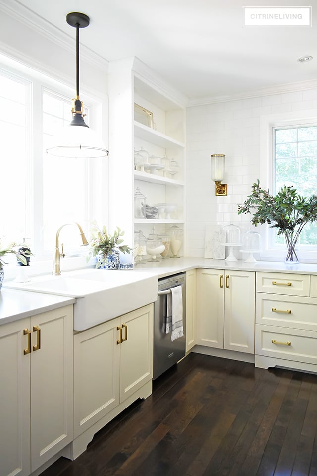 Fall kitchen decorating that is simple yet beautiful - warm metals, simple greenery and a just a few accessories for gorgeous pared-back style.