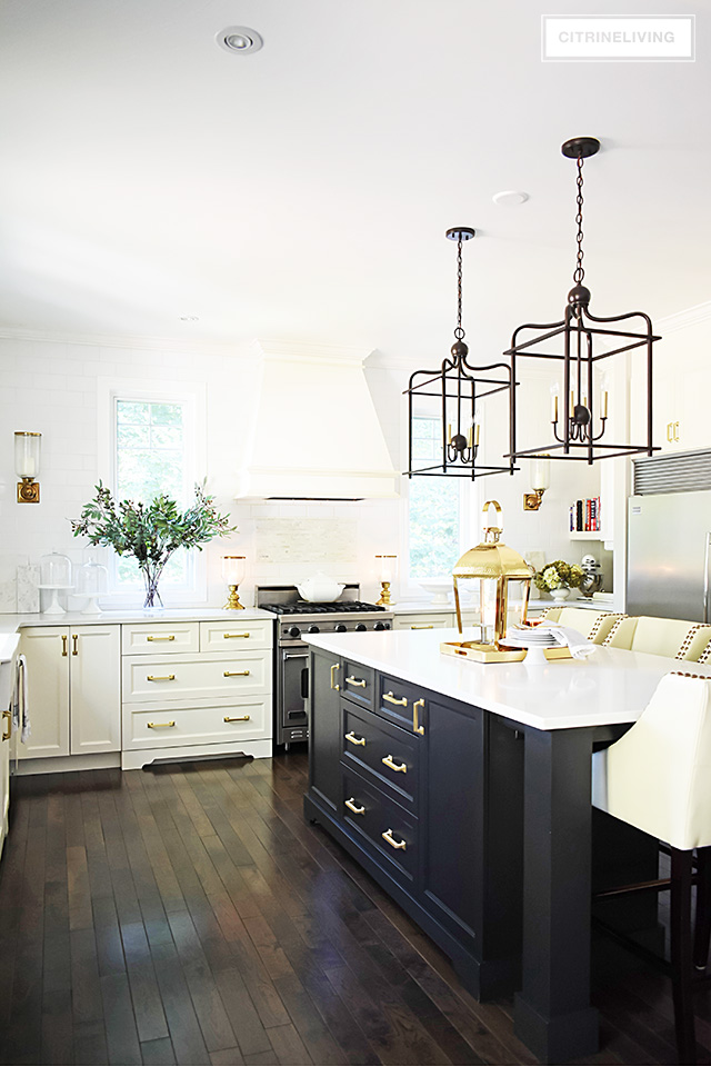 Fall kitchen decorating that is simple yet beautiful - warm metals, simple greenery and a just a few accessories for gorgeous pared-back style.