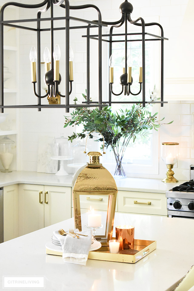 Fall kitchen decorating that is simple yet beautiful - warm metals, simple greenery and a just a few accessories for gorgeous pared-back style.