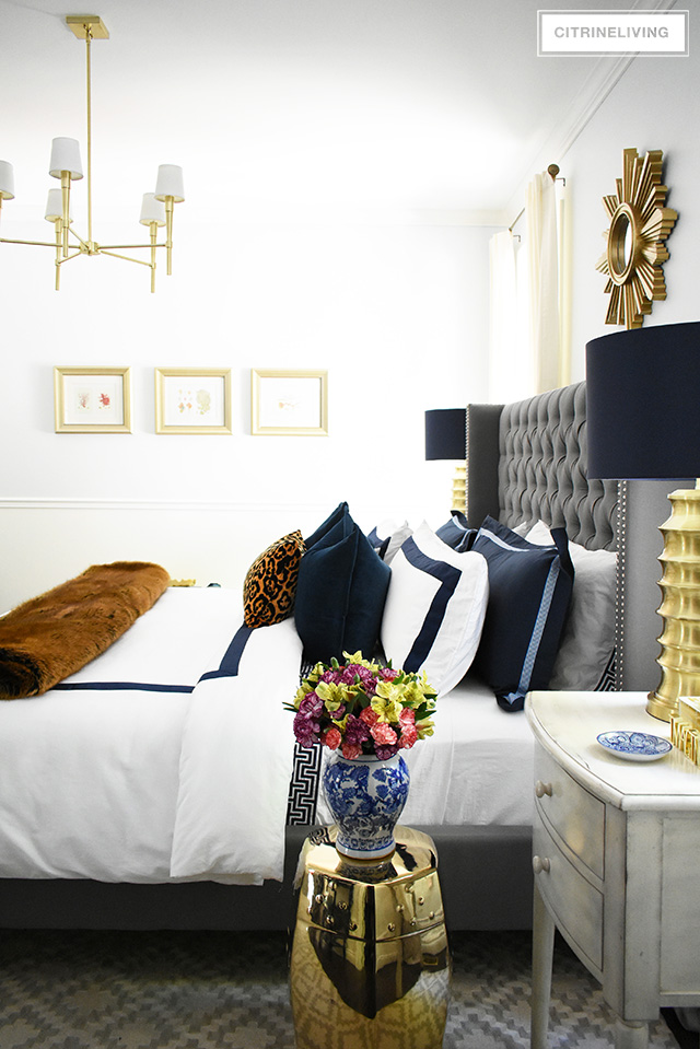 Fall bedroom decor with navy, leopard and faux fur - easy tips to transform your room for less than $20! By CitrineLiving #fallbedroomdecor #bedroom #fallbedroom #falldecor #falldecorating #falldecoratingideas #bedroomdecor #masterbedroom 