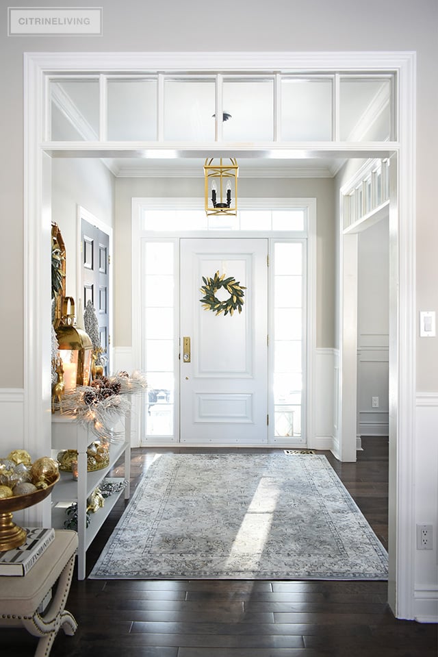 Give your entryway Christmas decorating a luxe look this season using layers of beautiful metallics, for a rich and elegant welcome.