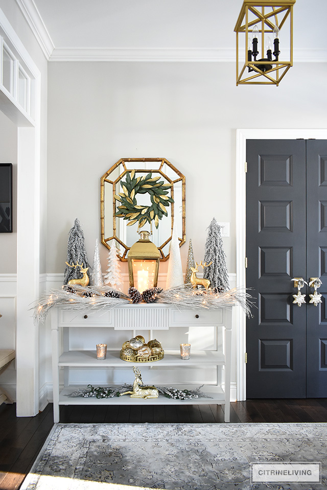 Give your entryway Christmas decorating a luxe look this season using layers of beautiful metallics, for a rich and elegant welcome.