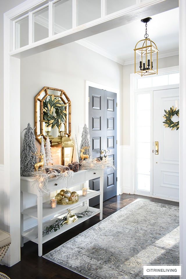 Give your entryway Christmas decorating a luxe look this season using layers of beautiful metallics, for a rich and elegant welcome.