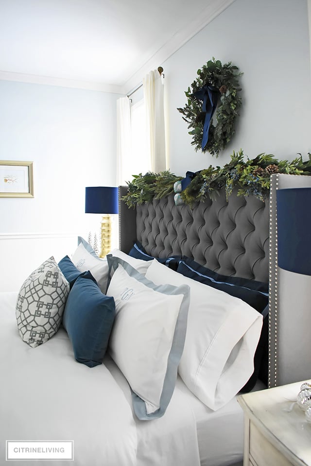 Create a gorgeous, luxurious Christmas bedroom you'll never want to leave with beautiful bedding and festive holiday greenery!