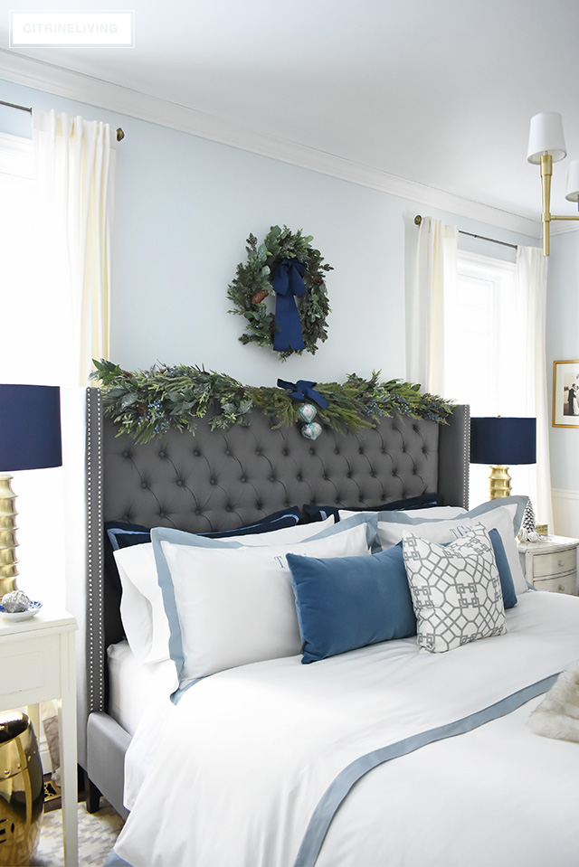 Create a gorgeous, luxurious Christmas bedroom you'll never want to leave with beautiful bedding and festive holiday greenery!