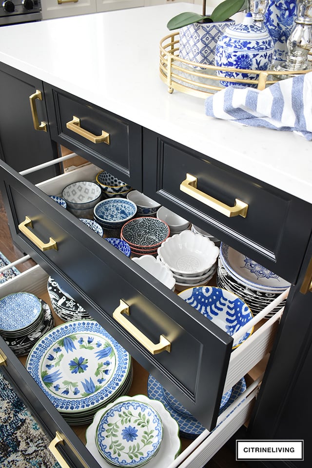 Organized kitchen drawers, bowl and plates