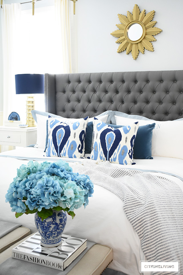 Simple and affordable master bedroom decorating tips for spring - see how easy it is to refresh your bedroom for a new season!