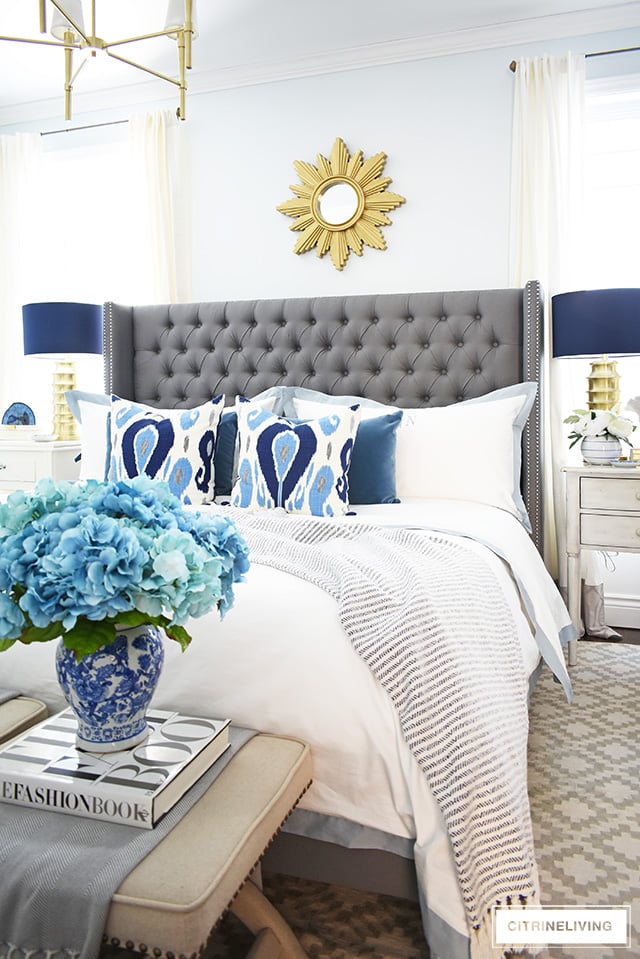 Simple and affordable master bedroom decorating tips for spring - see how easy it is to refresh your bedroom for a new season!