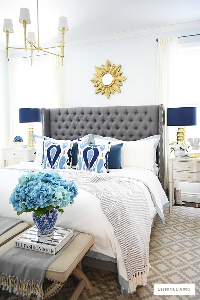 Simple and affordable master bedroom decorating tips for spring - see how easy it is to refresh your bedroom for a new season!