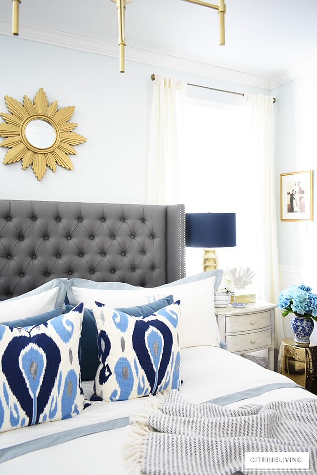 Simple and affordable master bedroom decorating tips for spring - see how easy it is to refresh your bedroom for a new season!