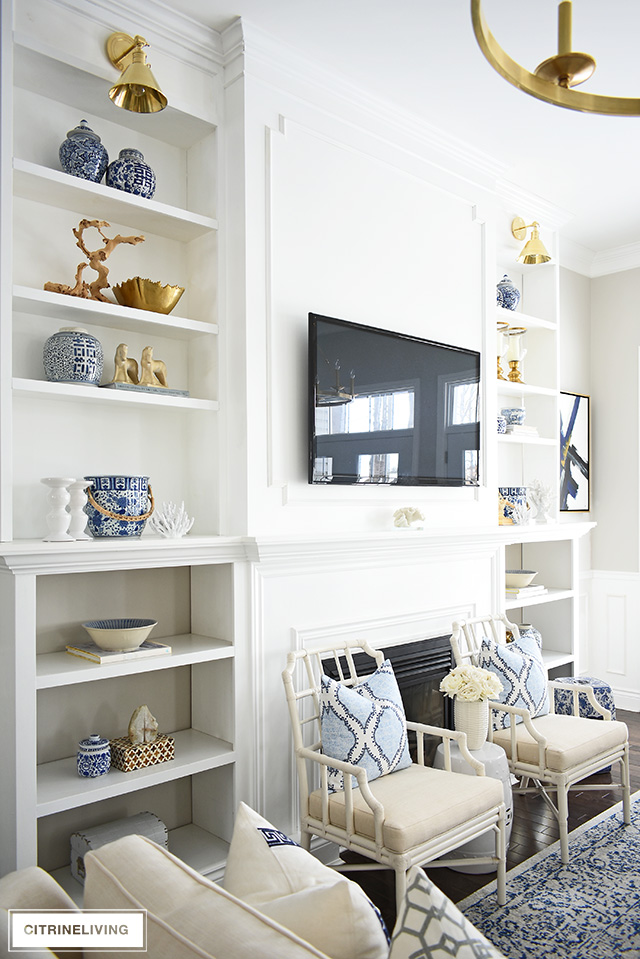 Styling shelves can be tricky! I'm sharing how to decorate bookshelves with simple ideas that you can use to create a gorgeous spring-styled space!