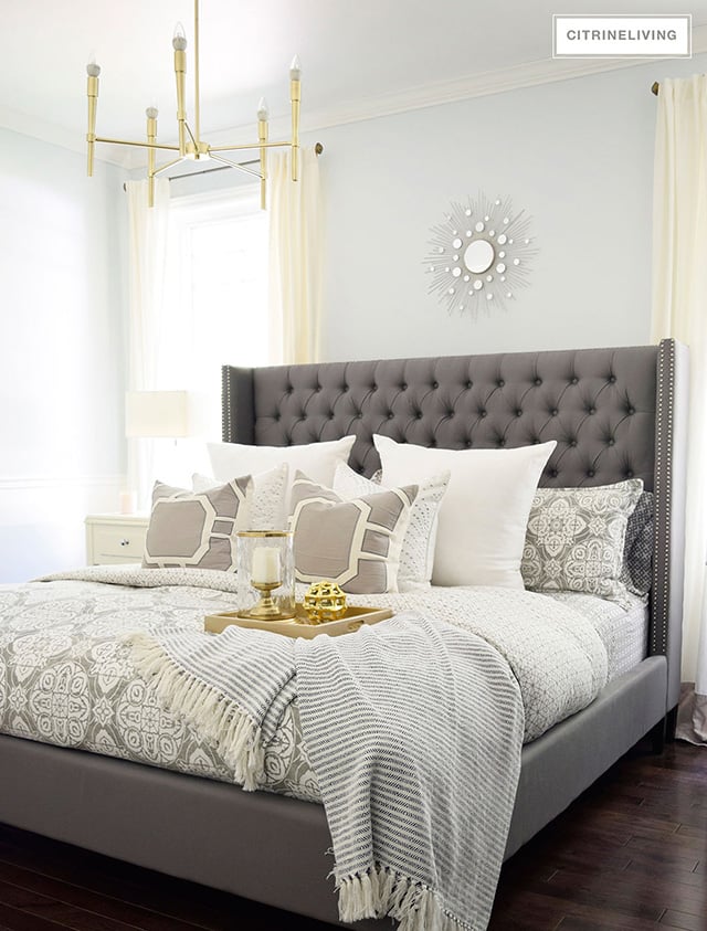 https://citrineliving.com/wp-content/uploads/2019/05/one-bed-eleven-different-looks-grey-medallion-print-bedding-geographic-pillows-1.jpg