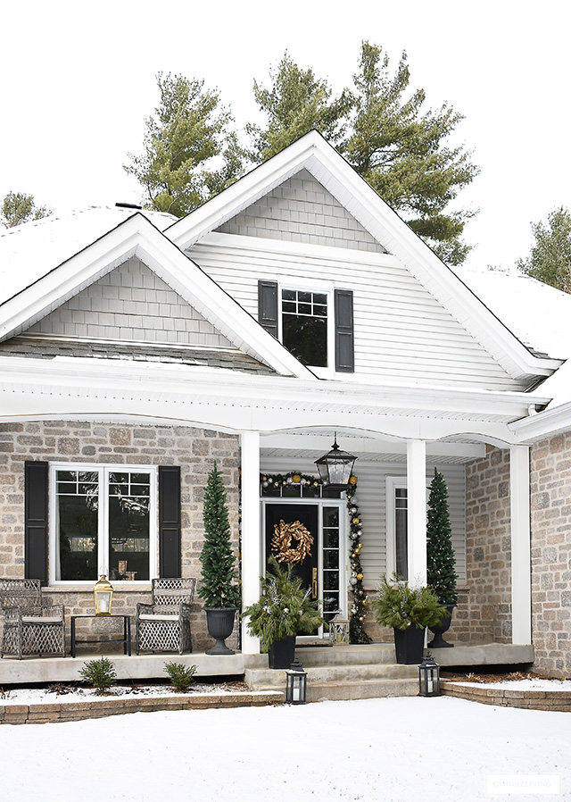 Front porch with elegant Christmas decor.