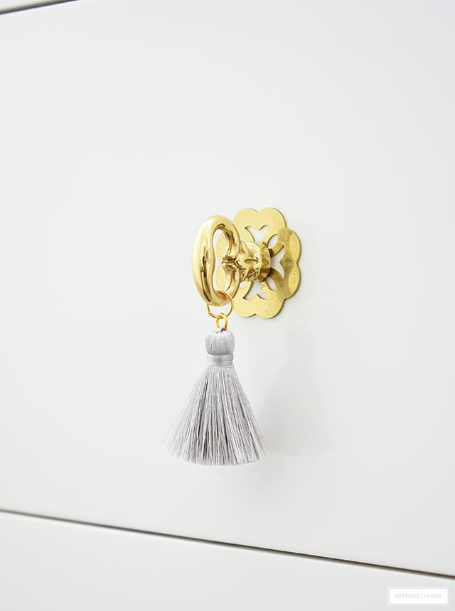 Beautiful brass hardware with tassel pull.