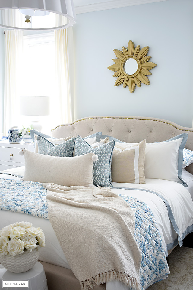 https://citrineliving.com/wp-content/uploads/2020/04/how-to-style-a-bed-with-pillows-blue-and-beige-2.jpg