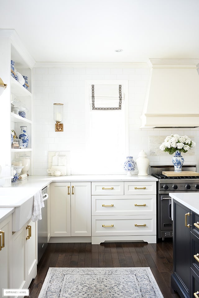 Elegant kitchen featuring blue and white accessories for spring.