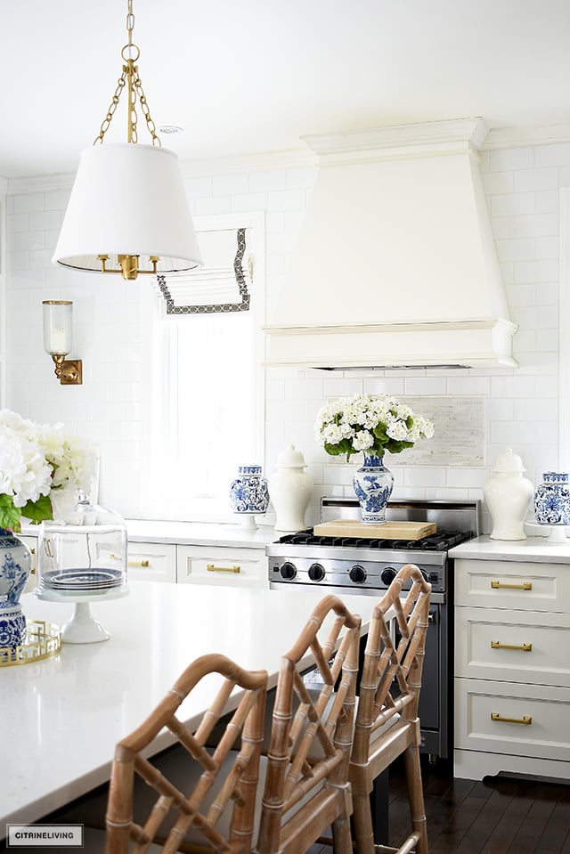 Beautiful blue and white accessories elevate this kitchen for spring with a fresh and vibrant look.