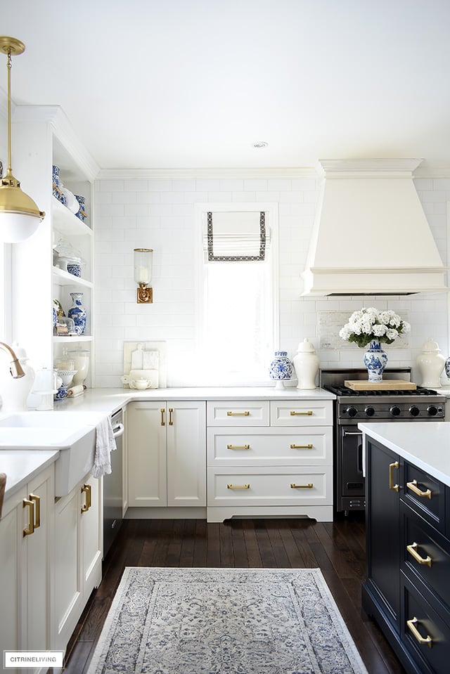 Beautiful Spring decorated kitchen using blue and white accessories.