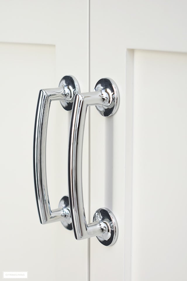 Beautiful arch shaped silver bathroom hardware.