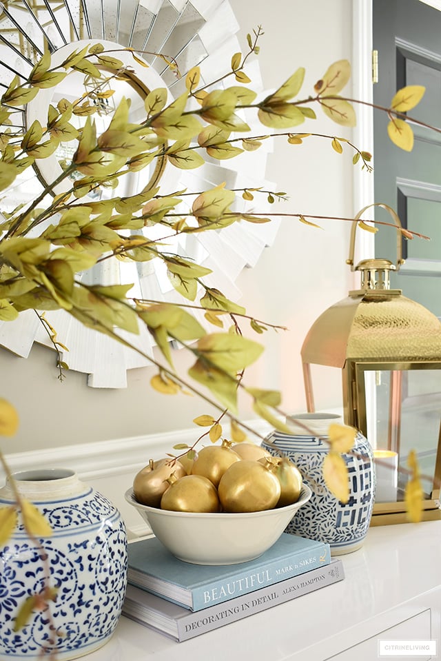 Beautiful faux gold fruit and ginger jars for fall decor are elegant and effortless!