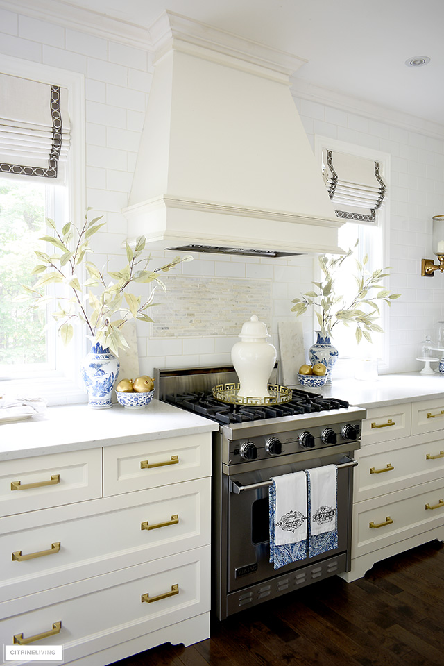 White kitchen with fall accents in blue, white and gold are elegant and sophisticated!