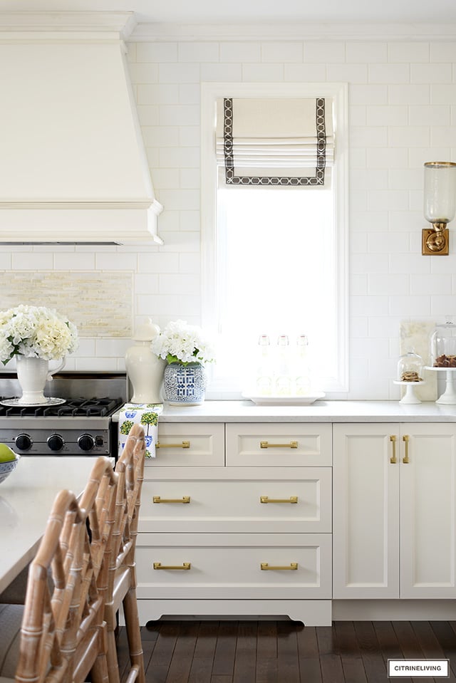 Spring kitchen decor with blue and white chinoiserie and faux florals.