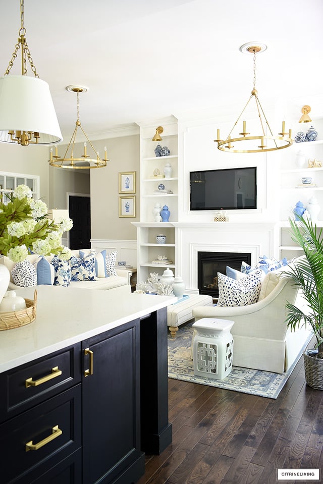 A view of the living room from the kitchen in an open concept home.