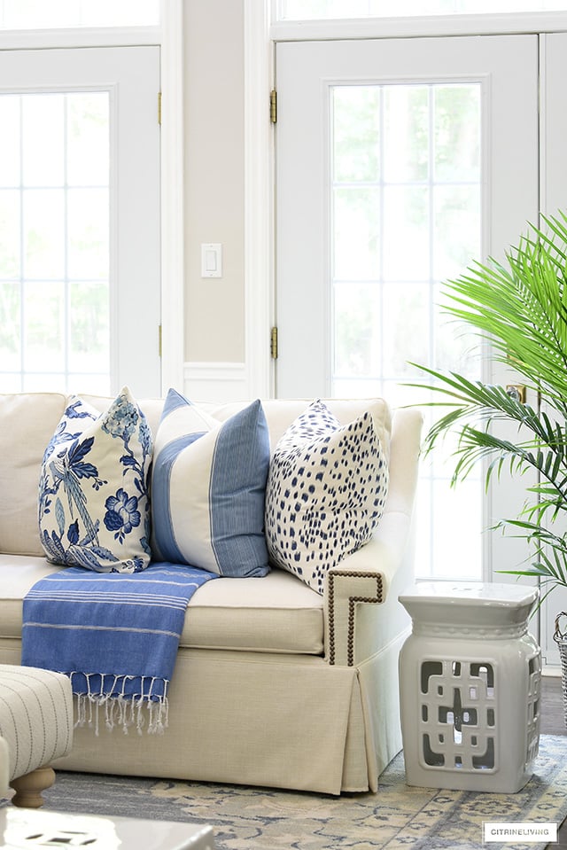 Blue and white pillows styled for summer!