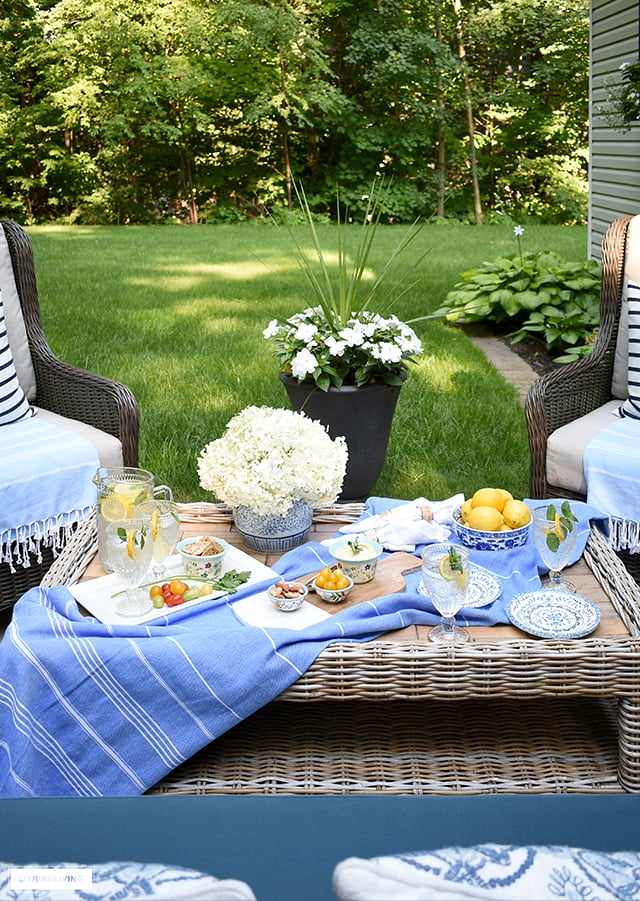 Backyard setting with a beautifully styled tablescape for casual dining.