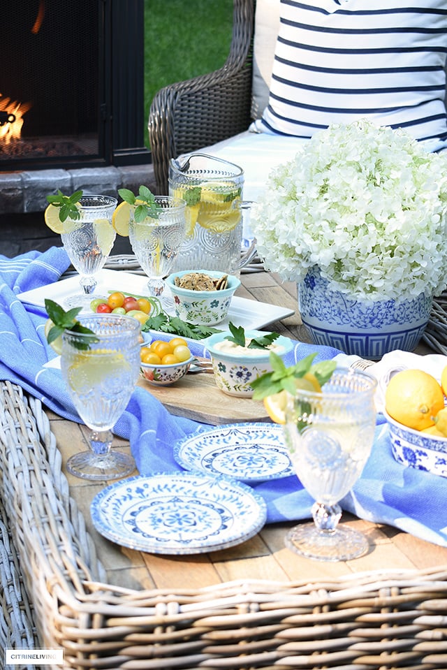 Causal tablescape styled for summer outdoor entertaining.