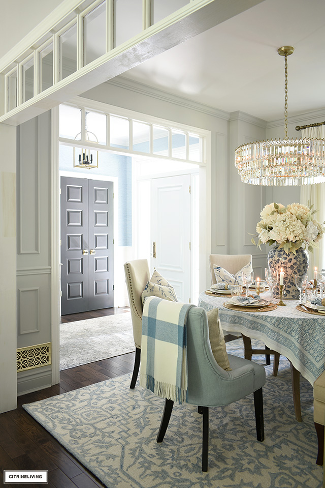 Fall dining room decor with soft blues and warm neutrals