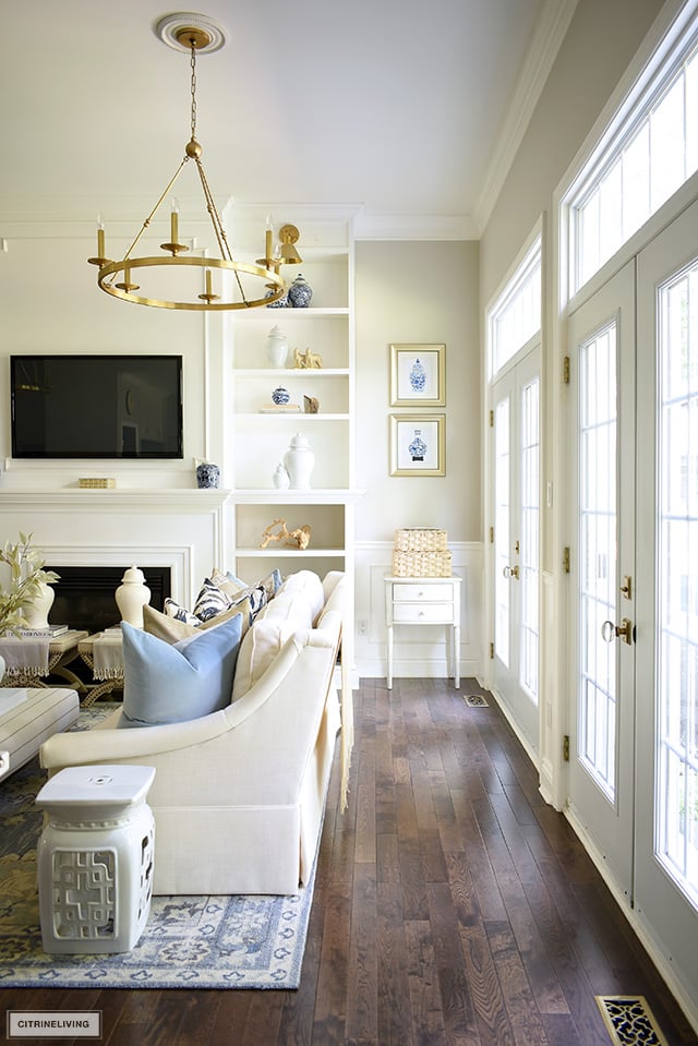 Living room view decorated for fall with simple seasonal accessories.