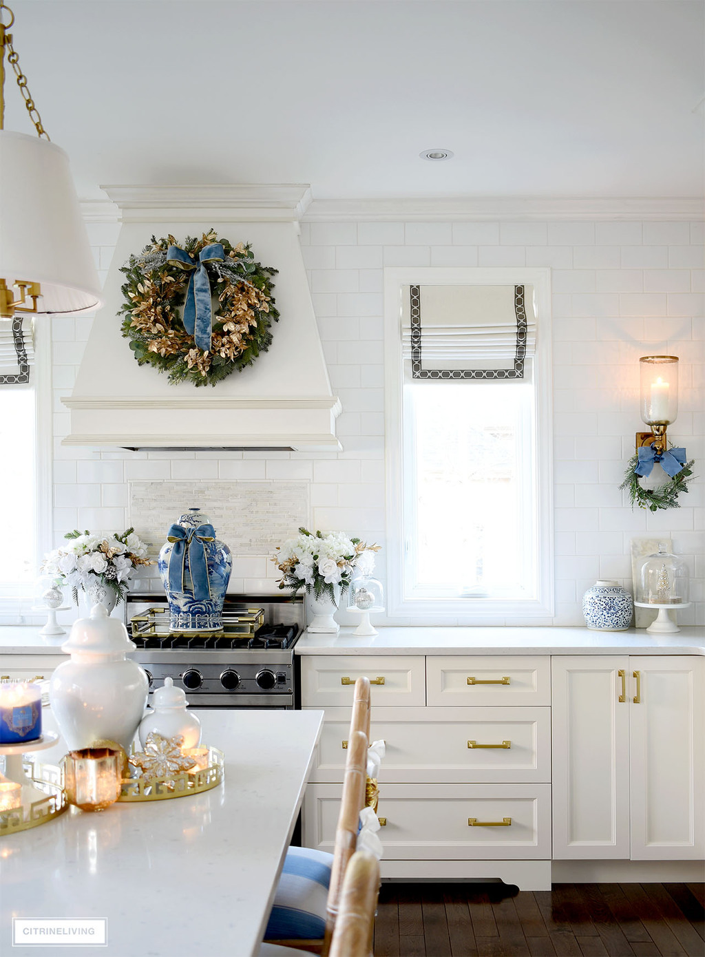 https://citrineliving.com/wp-content/uploads/2021/11/christmas-kitchen-decor-wreath-gold-blue-accessories.jpg