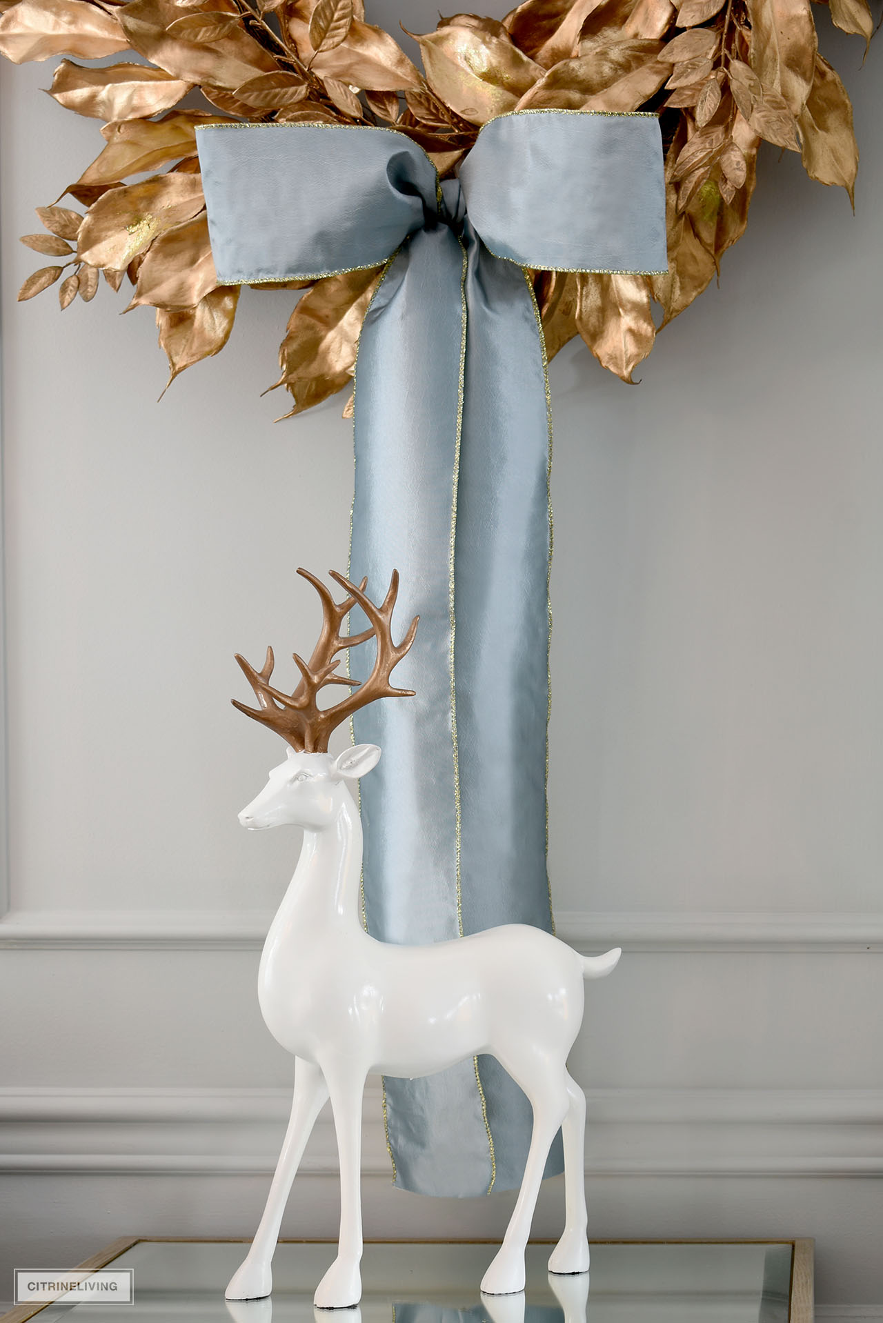 Simple and elegant white and gold reindeer.