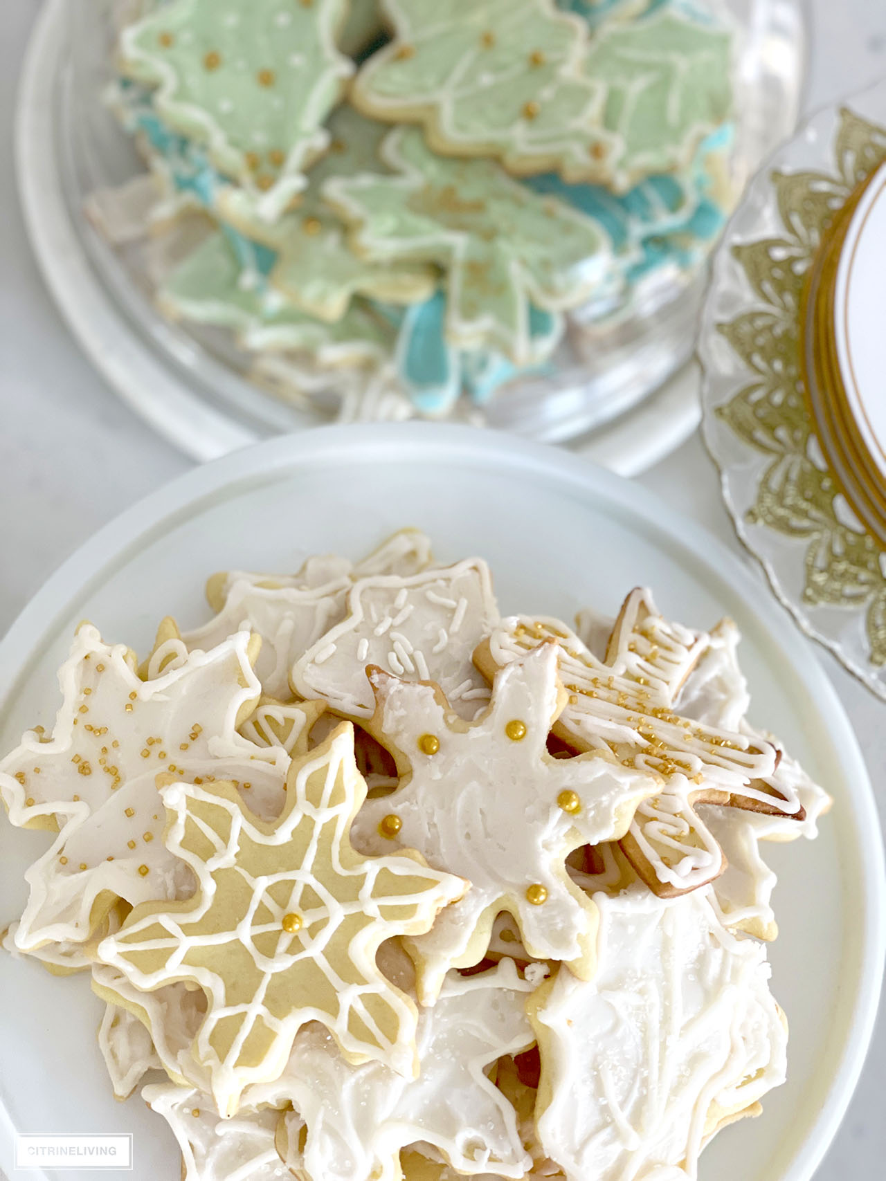 Beautiful assortment of white decorated Christmas sugar cookies.