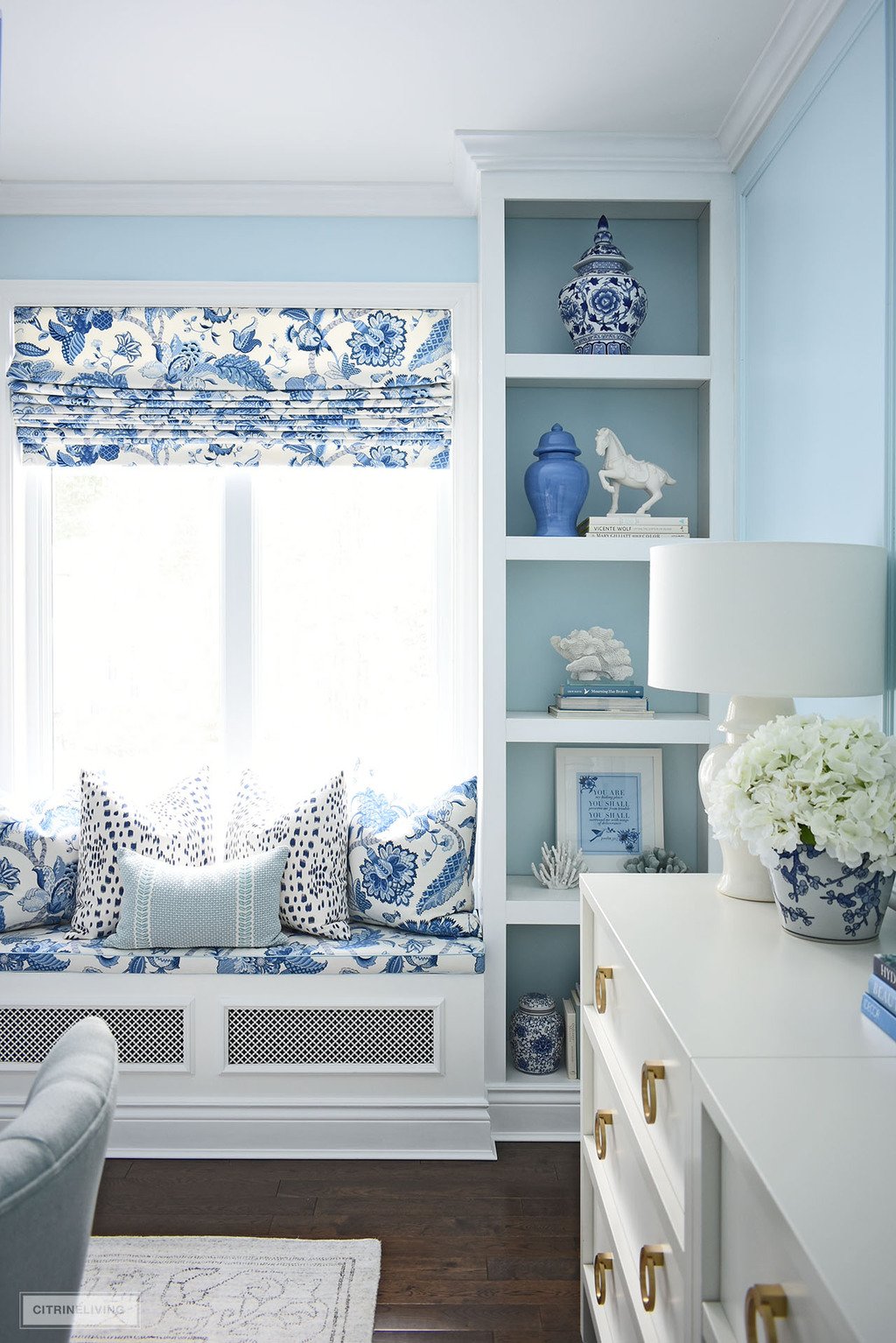 Home office decorated in a chinoiserie blue and white color palette.