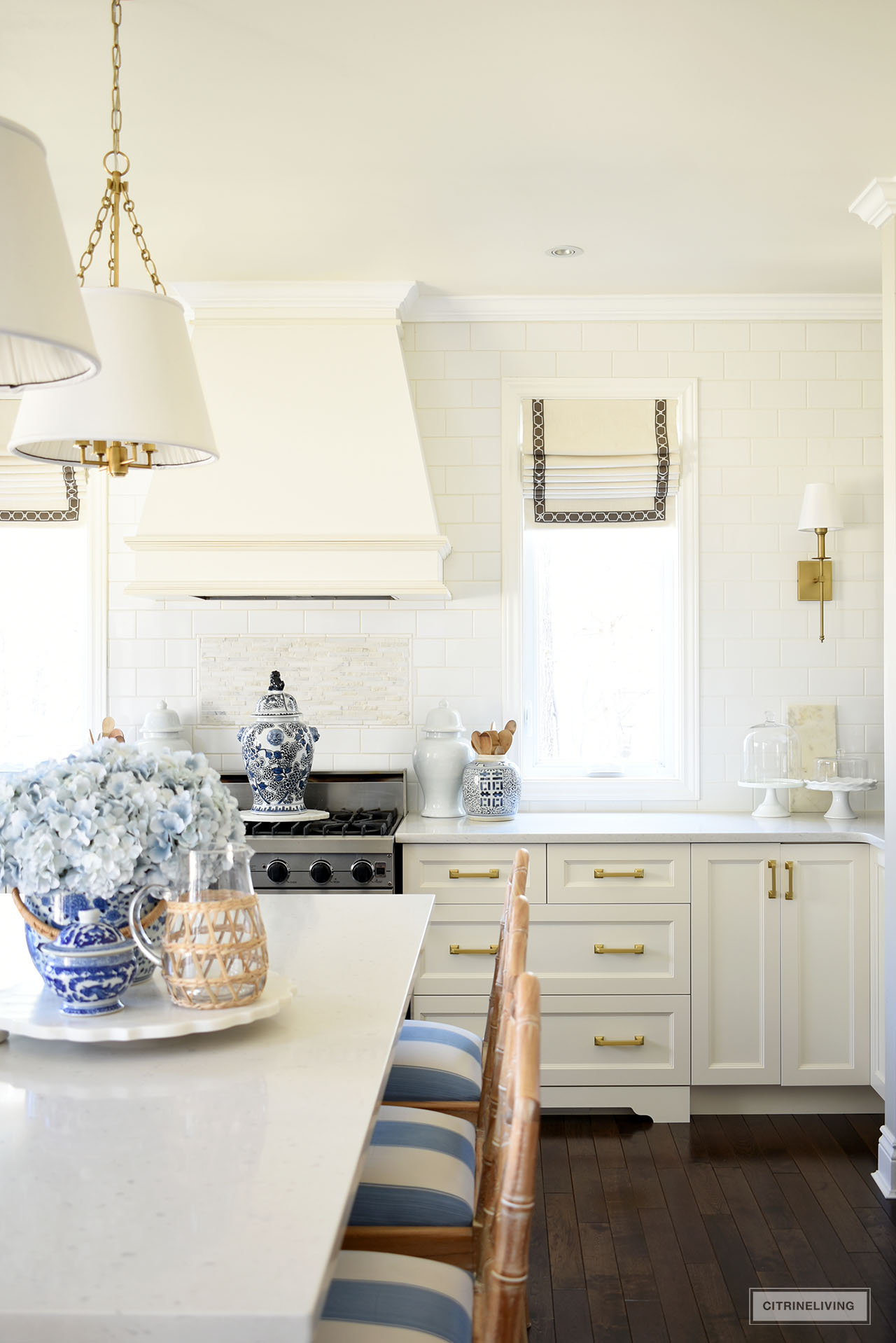 Beautiful white kitchen styled with simple accents for spring.