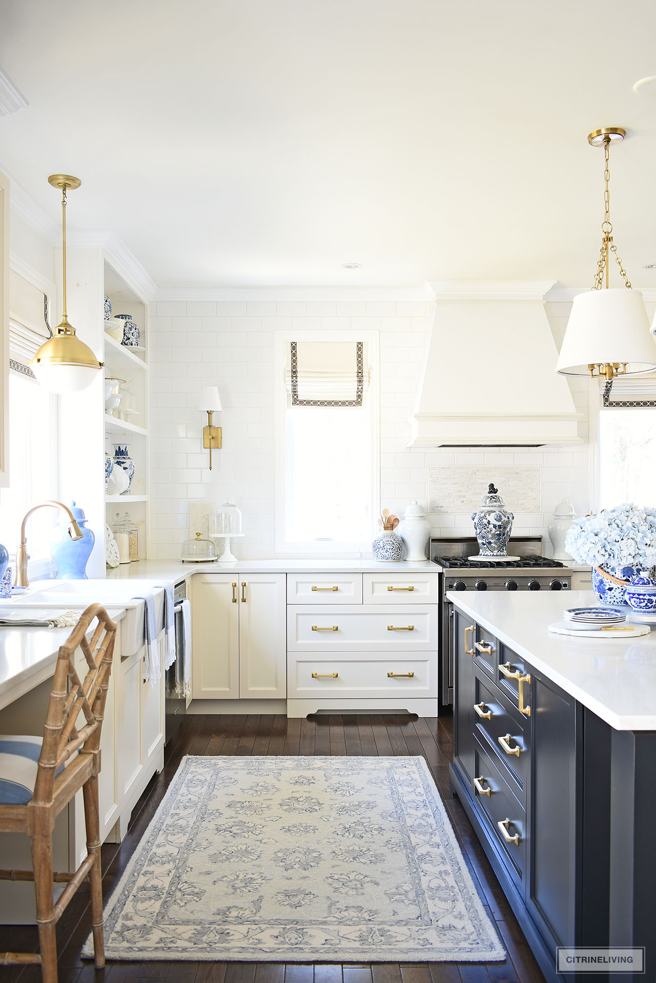 White kitchen styled for spring with blue and white chinoiserie.