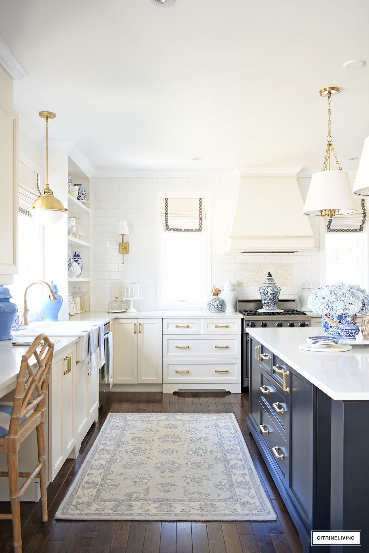 Kitchen decor for spring with touches of blue and white chinoiserie accents, blue towels, blue hydrangeas and woven pieces.