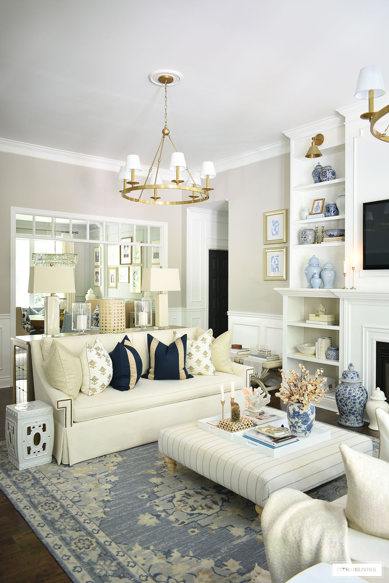 Fall living room decor with elegant navy blue, tan and gold