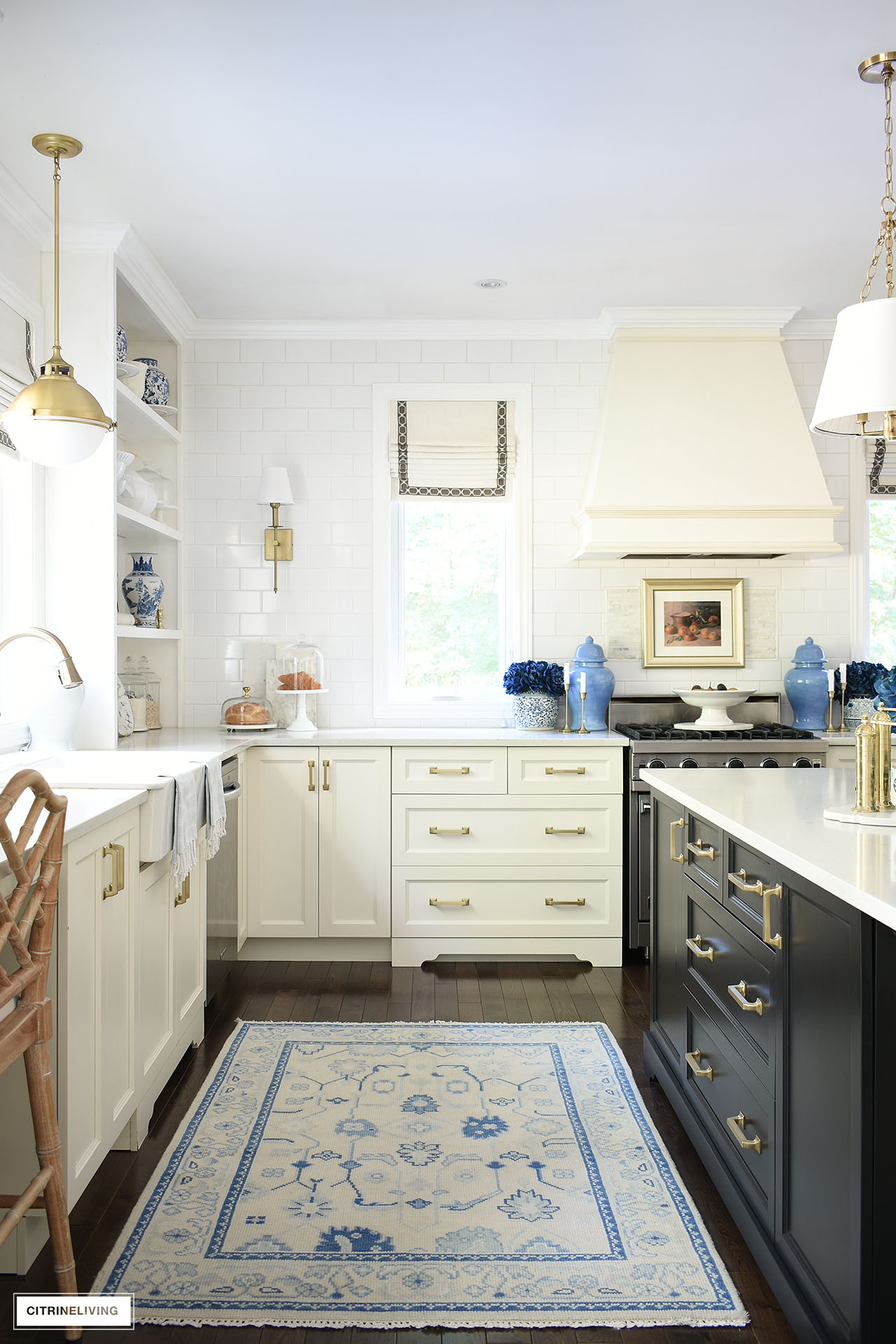 Gorgeous fall kitchen decorated with blue accents, blue florals, gold touches and rustic elements.