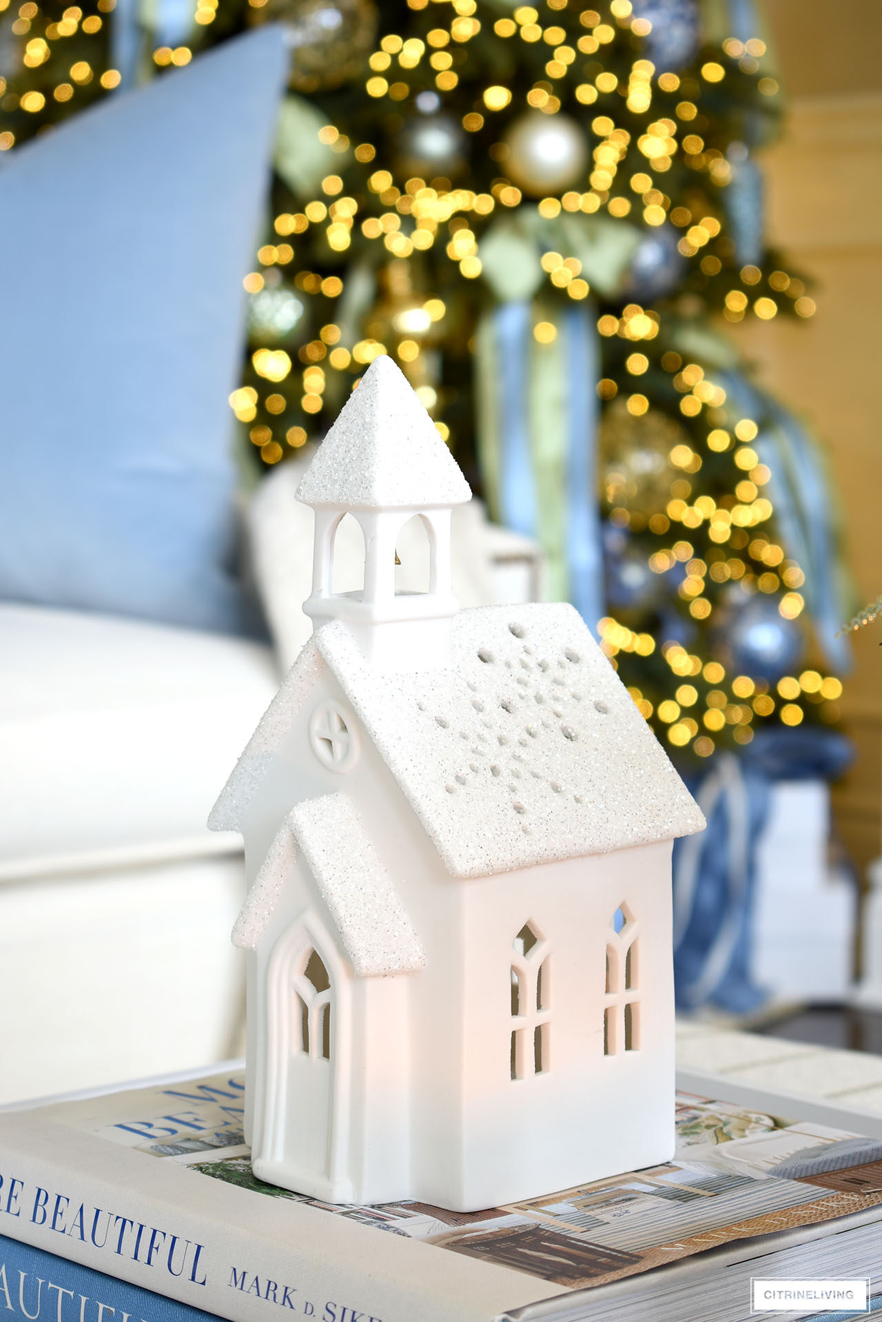 A beautiful white ceramic Christmas village church
