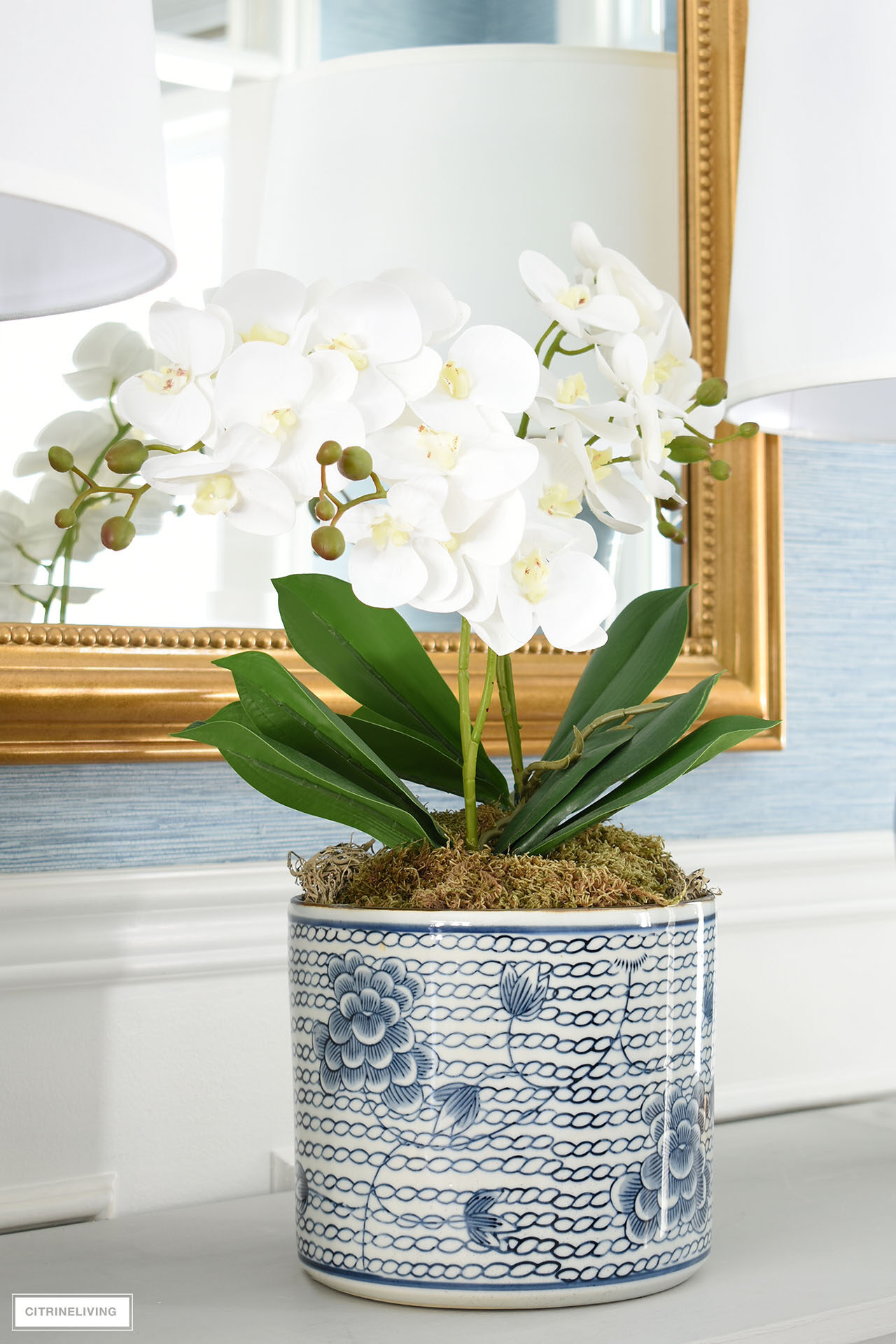Beautiful faux orchid arrangement