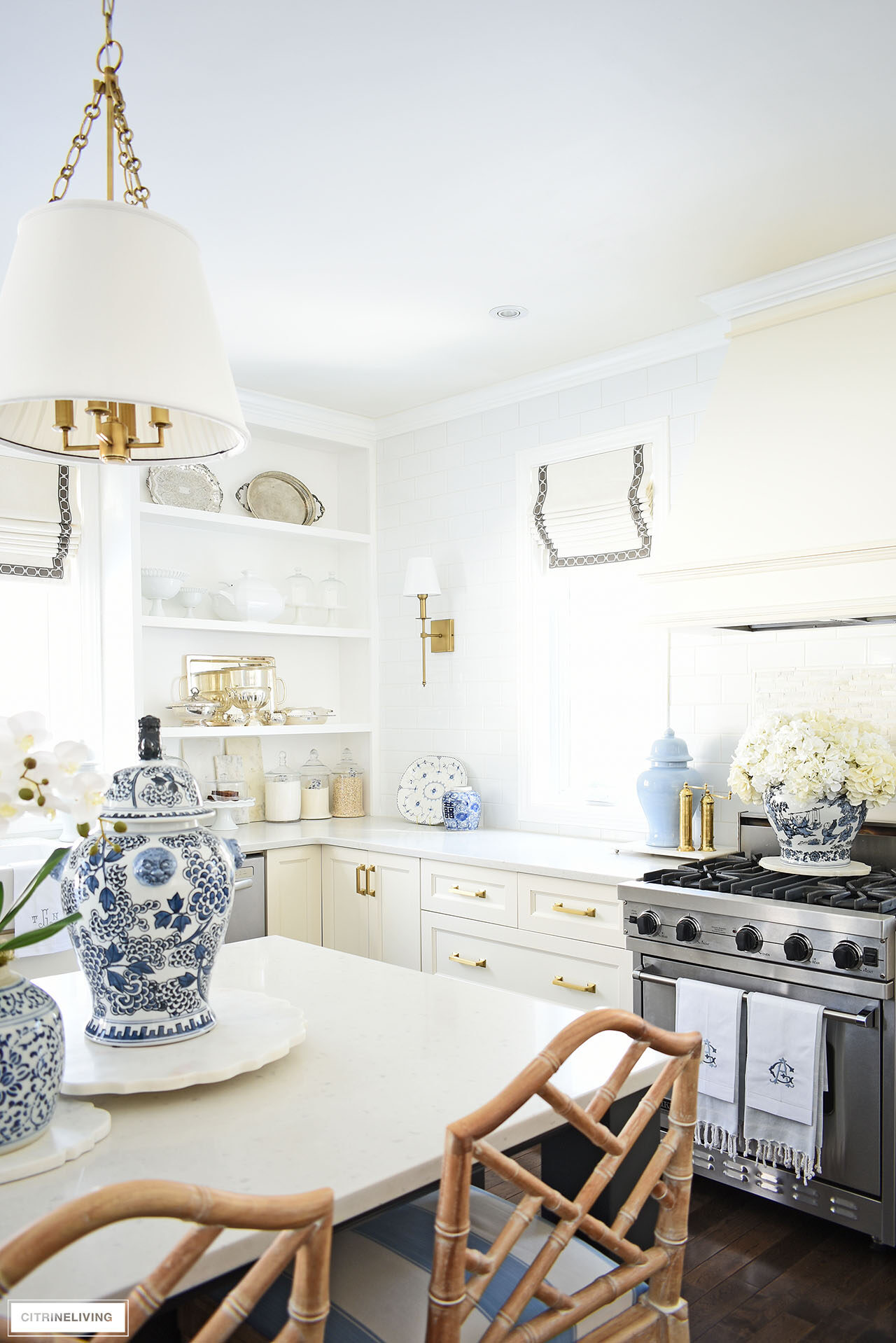 Traditional kitchen decorated for spring with blue and white chinoiserie.