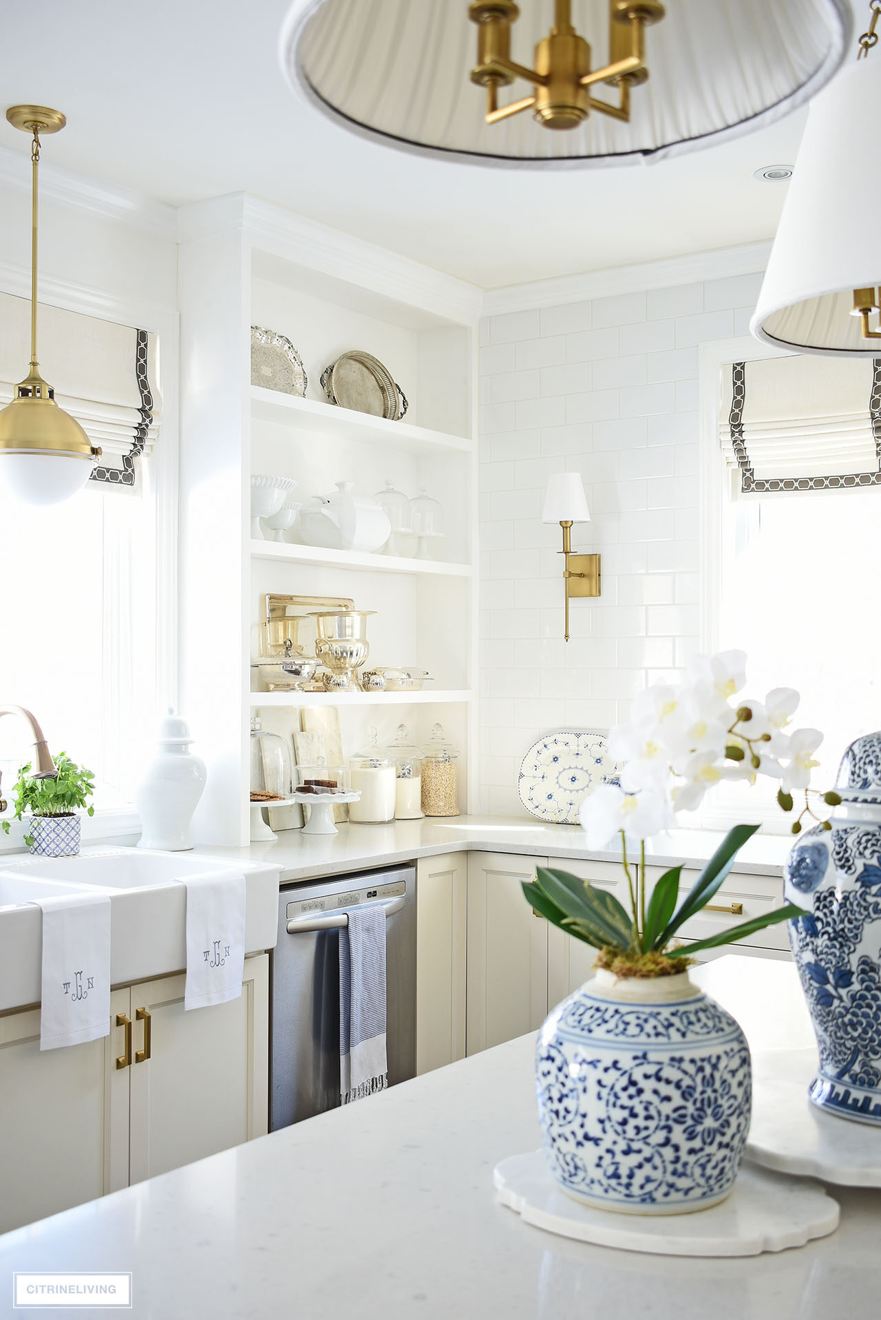 Elegant and classic kitchen decorated for spring with blue and white chinoiserie.