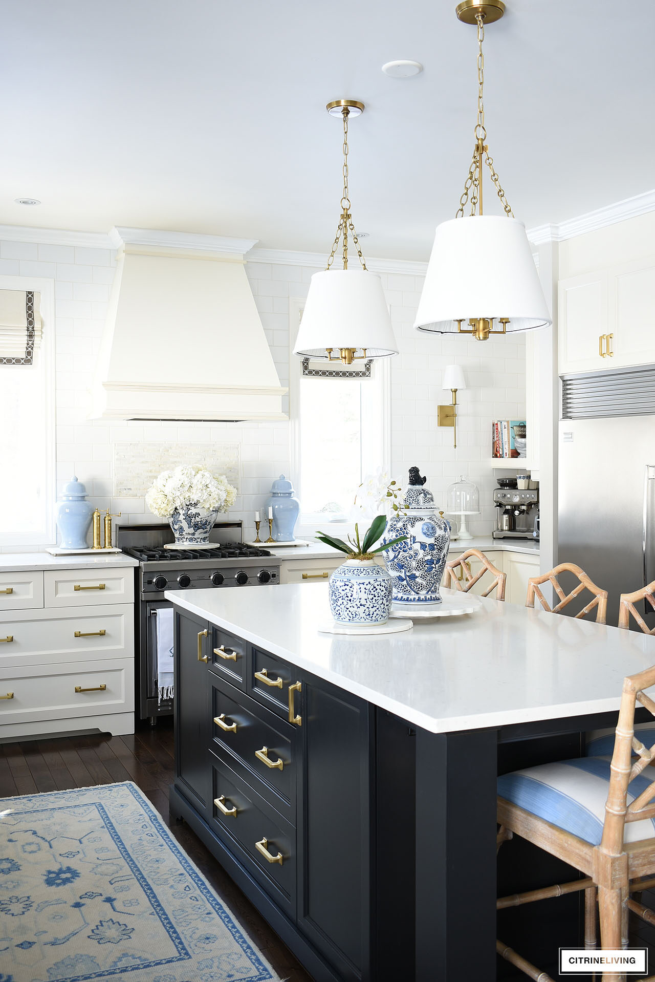 Traditional kitchen decorated for spring with simple touches in blue and white, orchids, hydrangeas and ginger jars.