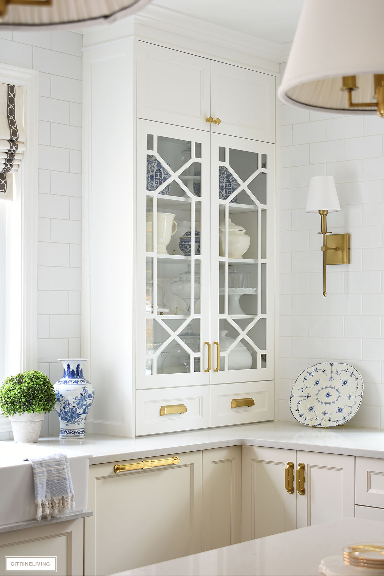 white kitchen custom glass cabinet