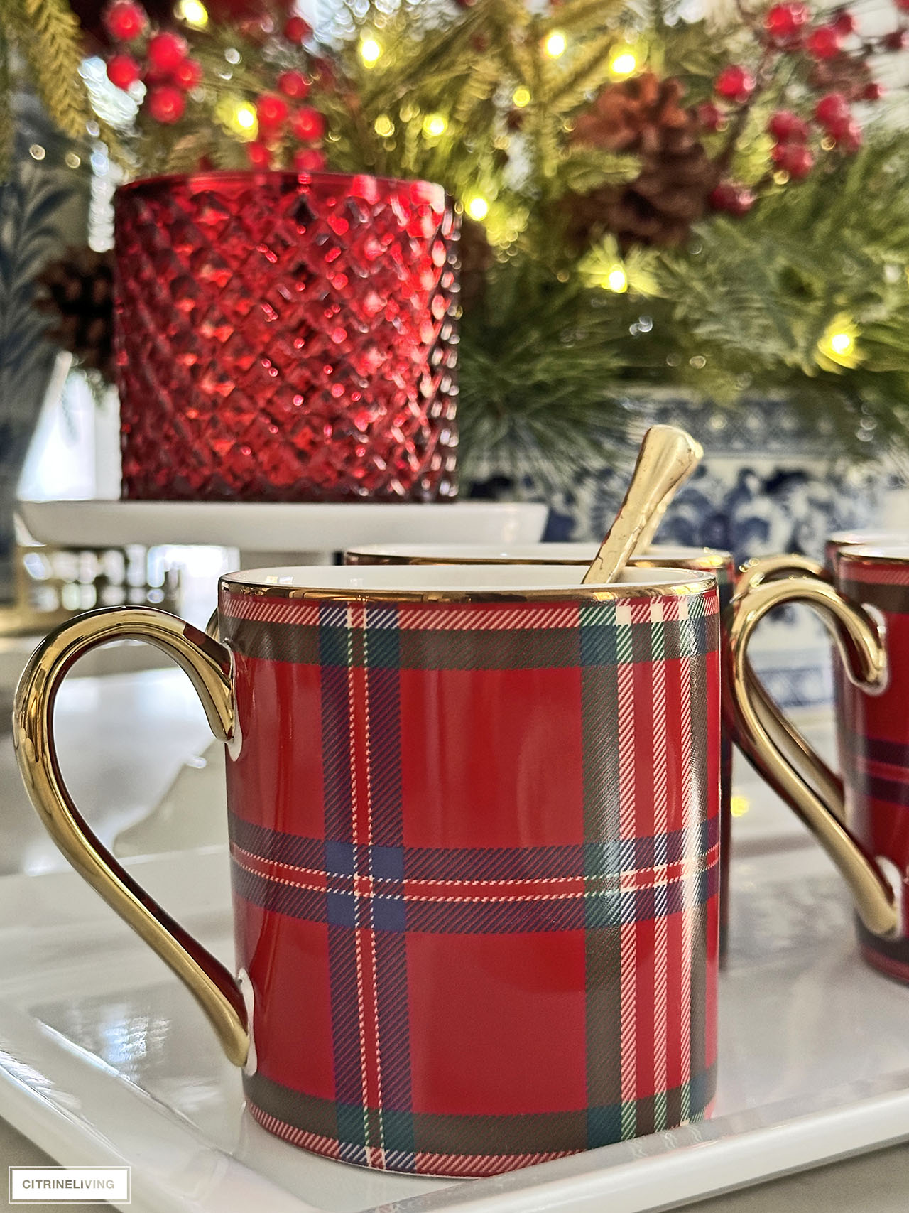 Red tartan mugs with gold handles