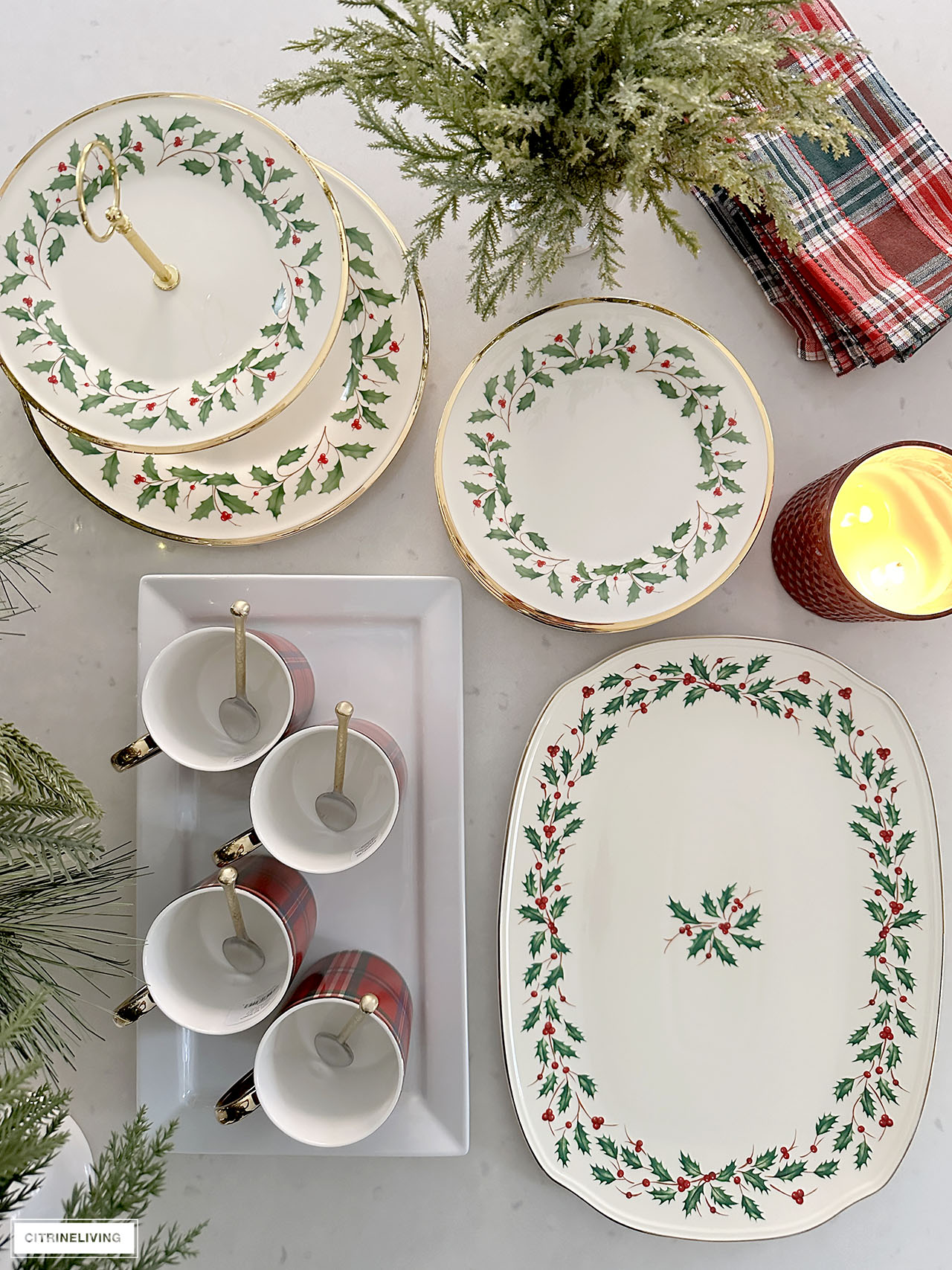 Christmas dishware with holly and berry motif